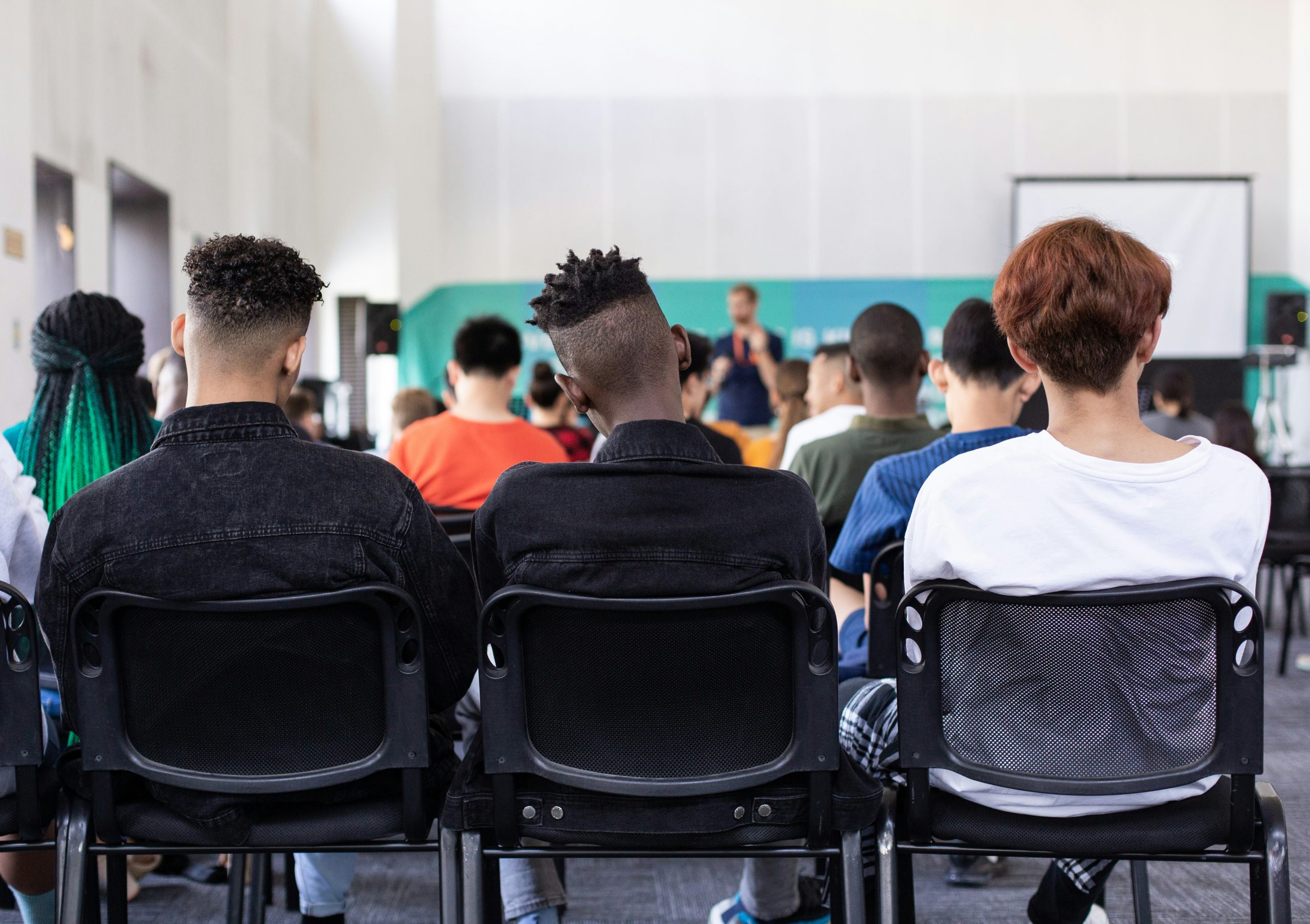 A college classroom viewed from the back of the room.