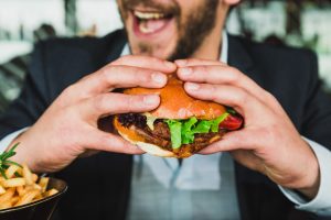 Man eating a hamburger