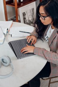 Girl typing on a computer