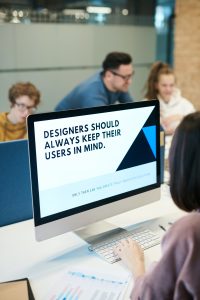 A computer screen that says, designers should always keep their users in mind.