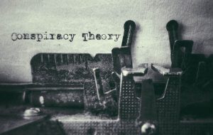 Conspiracy Theory text typed on paper with old typewriter stock photo