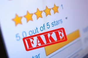 Online review with the word "fake" affixed.