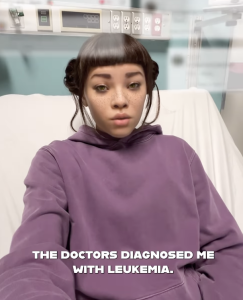 Part of an Instagram post showing Lil Miquela with the text "The doctors diagnosed me with leukemia."