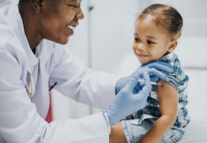 Child receiving a shot.